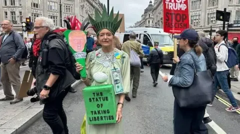 Numerous Protesters Assemble in Central London to Denounce Trump's Official UK Trip